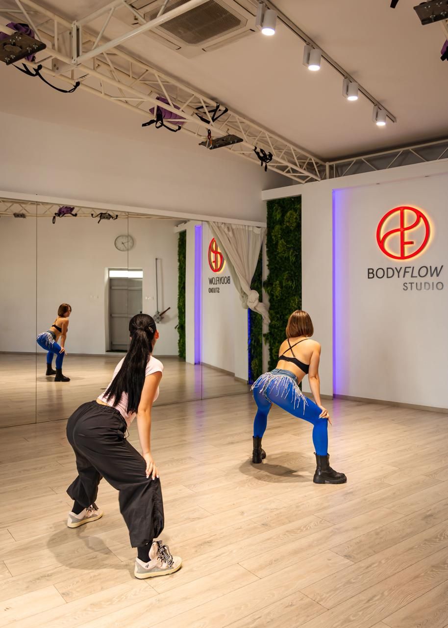 Twerk class practising in front of the studio mirror